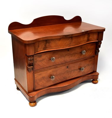 Lot 100 - A Victorian mahogany serpentine-fronted chest...