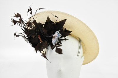 Lot 681 - PHILIP TREACY; a natural straw asymmetrical...