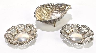 Lot 2408 - A sterling silver shell shaped bowl, length 14....