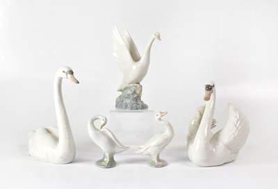 Lot 250 - LLADRÓ; two models of swans, together with two...