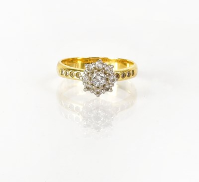 Lot 818 - An 18ct gold diamond cluster ring, with...