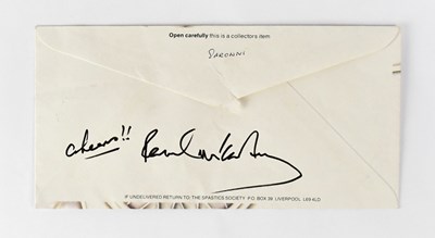 Lot 402 - PAUL MCCARTNEY; a used envelope signed and...
