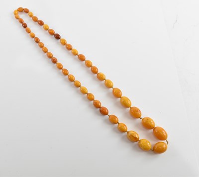 Lot 327 - A vintage hand tied egg yolk/butterscotch...