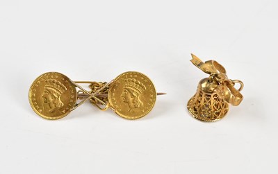 Lot 270 - A 9ct yellow gold bell shaped charm/fob and a...