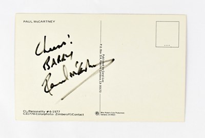 Lot 403 - PAUL MCCARTNEY; a colour postcard, signed and...