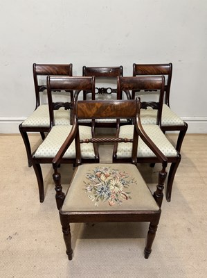 Lot 1170 - A set of four Regency mahogany bar back dining...
