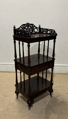 Lot 1141 - A Victorian rosewood three tier whatnot, with...
