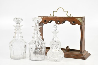 Lot 1380 - An 1920s oak tantalus, with silver plated...