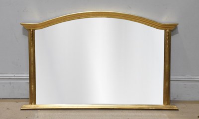 Lot 1018 - An ornate gilt and floral painted cartouche...