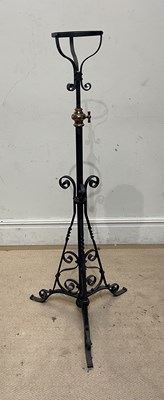 Lot 1569 - A wrought iron and copper telescopic oil lamp...