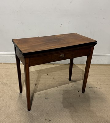 Lot 1231 - An Edwardian inlaid mahogany fold-over tea...