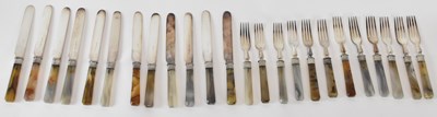 Lot 1042 - A set of twelve agate handled white metal...