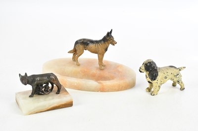 Lot 1471 - Two cold painted spelter dogs, comprising an...