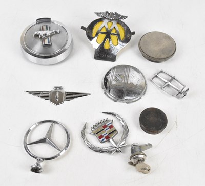 Lot 999 - AUTOMOBILIA; a Mustang chrome petrol cap,...