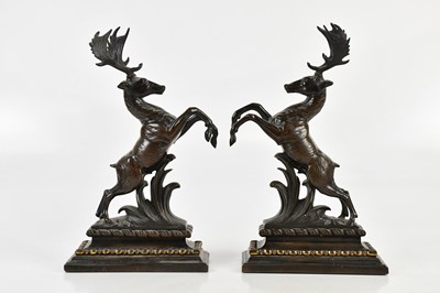 Lot 1541 - A pair of bronze stags, both on plinth bases,...