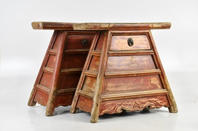 Lot 547 - A pair of Chinese red painted barber stools,...