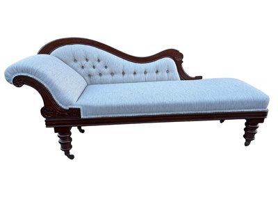 Lot 1145 - A Victorian carved and stained walnut chaise...