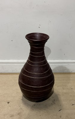 Lot 1308 - A large decorative brown painted vase with...