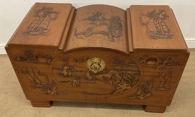Lot 579 - A Chinese carved camphorwood blanket box, with...
