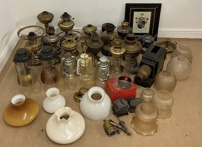 Lot 541 - A large number of brass lamps and various...