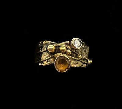 Lot 1154 - An unusual yellow metal citrine and diamond...