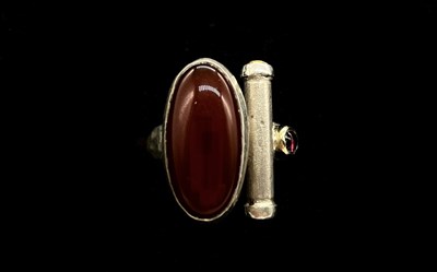 Lot 1157 - A silver abstract/modernist ring with large...