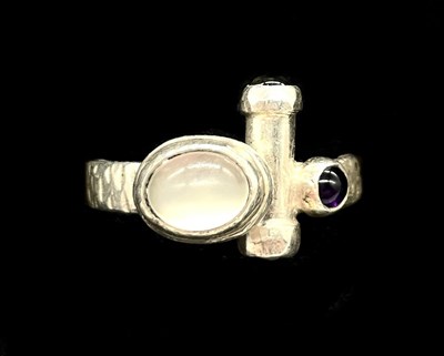 Lot 1158 - An abstract/modernist silver ring set with...