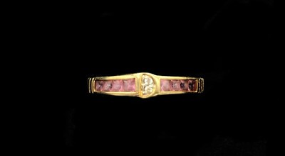Lot 1161 - A 14ct yellow gold pink sapphire and diamond...