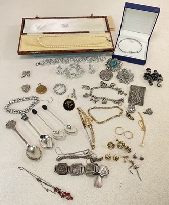 Lot 1112 - A small group of costume jewellery including...