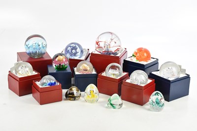 Lot 794 - A collection of paperweights including two...