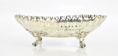Lot 1212 - A white metal oval pierced basket bearing...
