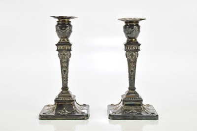 Lot 1036 - A pair of hallmarked silver weighted...