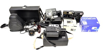 Lot 409 - A group of cameras, to include a Canon...
