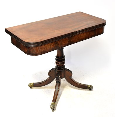 Lot 92 - A Regency-style mahogany fold-over tea table,...