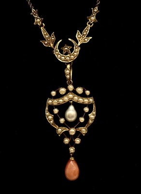 Lot 1284 - A 15ct yellow gold seed pearl and coral...