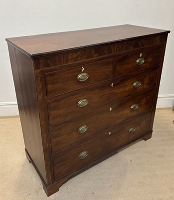Lot 1136 - An early 19th century mahogany chest with two...