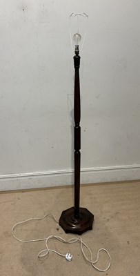 Lot 1258 - An Art Deco oak standard lamp, height 152cm.
