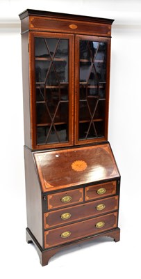 Lot 105 - An Edwardian mahogany and satinwood inlaid and...