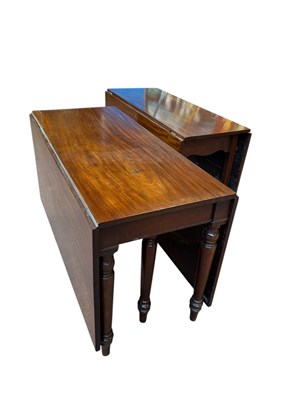 Lot 1255 - An early 19th century mahogany drop-leaf...