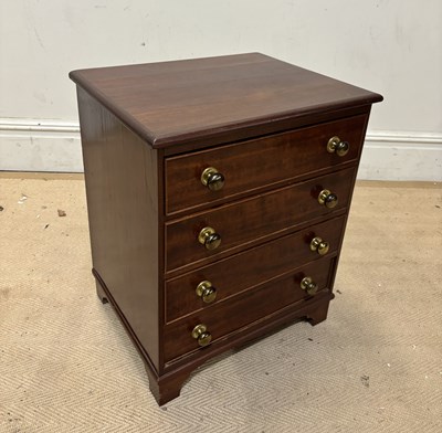 Lot 1223 - A mahogany chest of four drawers, height 60cm,...