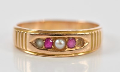Lot 183 - A 15ct rose gold ring set with seed pearls...