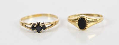 Lot 184 - Two 9ct yellow gold sapphire set rings, sizes...
