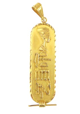 Lot 1178 - A gold Egyptian tablet-style pendant with...