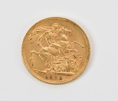 Lot 335 - An Edward VII full sovereign, 1909, presented...