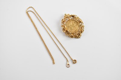 Lot 328 - An Edward VII full sovereign, 1903, set in 9ct...