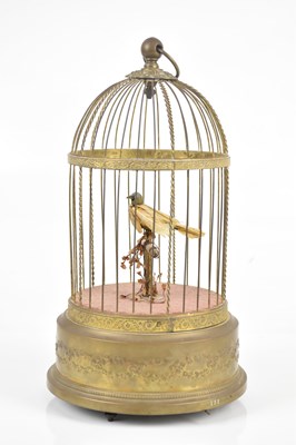 Lot 1411 - A 20th century singing bird automaton in gilt...