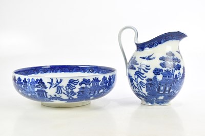 Lot 688 - DOULTON BURSLEM; a 'Willow' pattern wash jug...