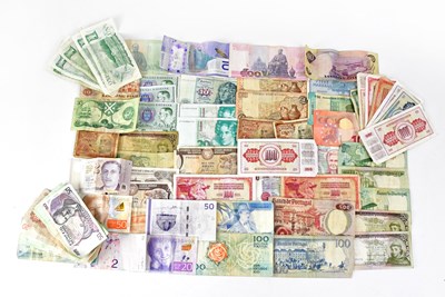 Lot 707 - A collection of World banknotes, to include...