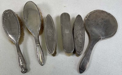 Lot 1070 - Two silver backed dressing table sets, both...