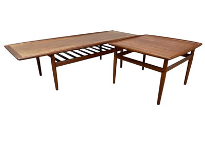 Lot 1009 - A mid century teak 'Long John' style...